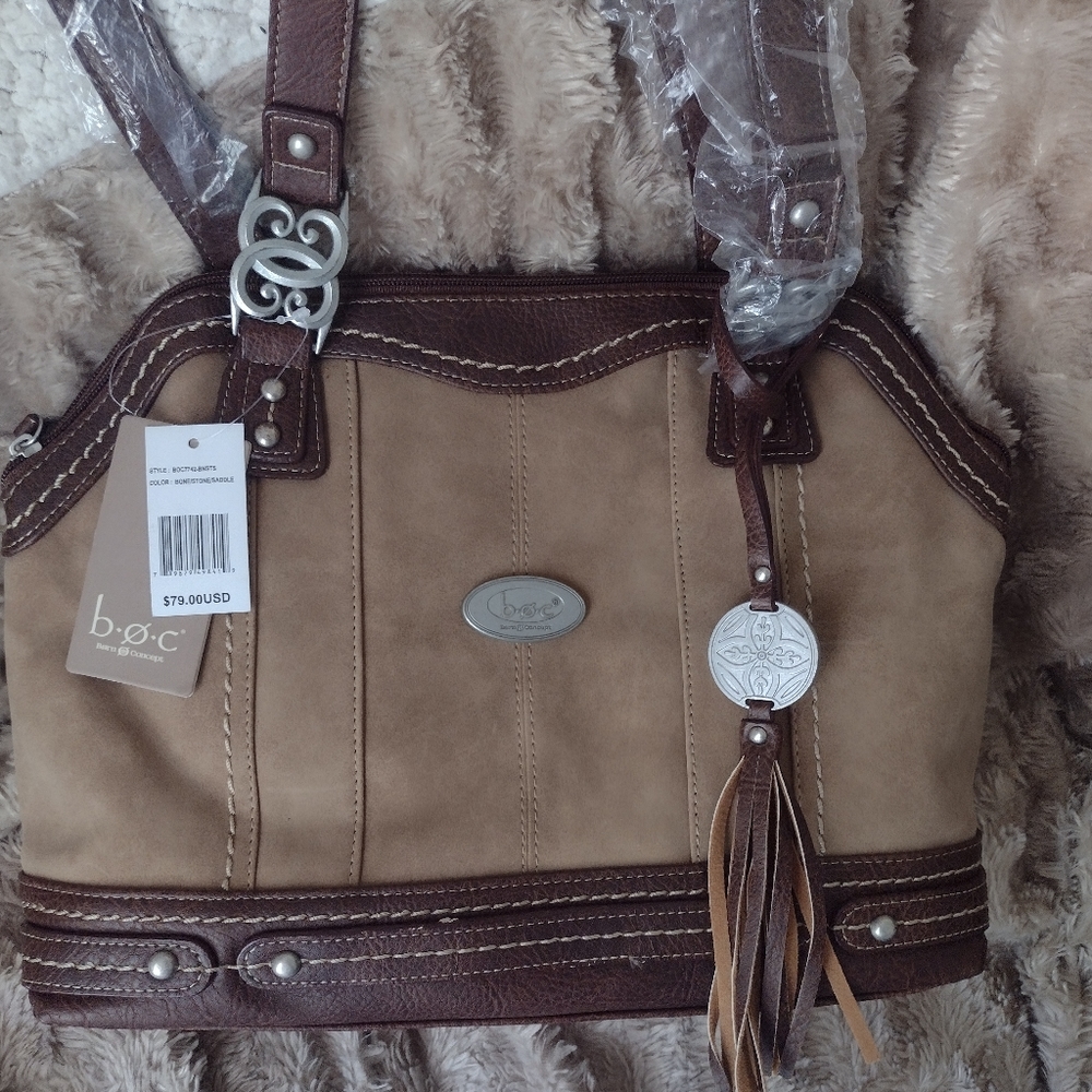 Born Concept purse. Brand New in package with tags.